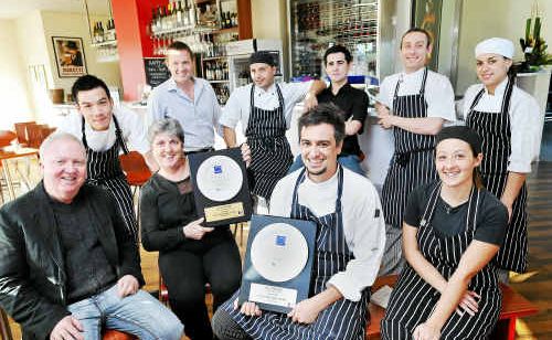 The winning team at Cafe Fiasco (from left back) Mark Hawkins, Alex Hawkins, Stefano Mazzina, Roberta Peluso, Kalena Overton-Tukana, Justin McConanchy, Kalena Overton-Tukana, Vuttichai Koosurojn Joe, Phil Caldicott and Daniel O’Dwyer. The winning team at Cafe Fiasco (from left back) Mark Hawkins, Alex Hawkins, Stefano Mazzina, Roberta Peluso, Kalena Overton-Tukana, Justin McConanchy, Kalena Overton-Tukana, Vuttichai Koosurojn Joe, Phil Caldicott and Daniel O’Dwyer.
